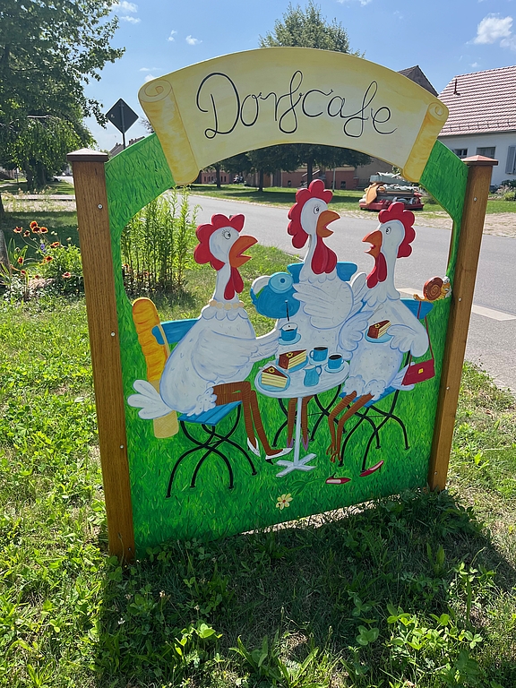 02_Hinweisschild_Dorfcafé.jpg